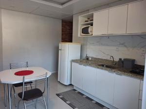 Refúgio Romântico entre o Verde e o Mar