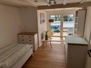 Ferienhaus"Huus an`t Diek" Luxus in Deichnähe mit Pool, Nähe Norddeich