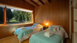 Stunning 4-Bedroom House Large Garden and Pool H61 by Apartments Bariloche