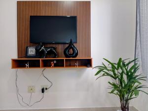 Apartamento com estacionamento no local