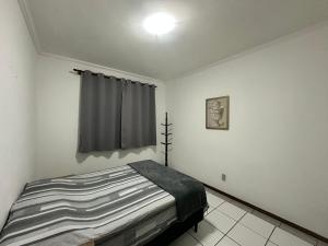 Apto no centro com garagem