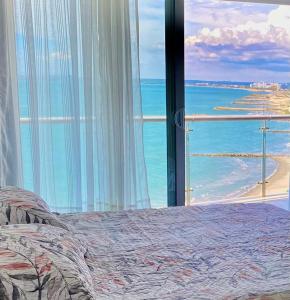 Ikigai frente al mar con piscina infinita y Gym