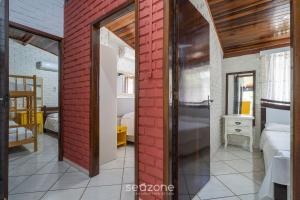 Linda casa a 230m da praia de Bombas RGV115