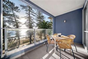 Wake to Waves, Elegant Beachfront Apartment