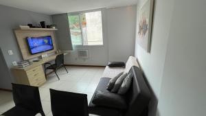 Apartamento confortável e com Piscina a 900 m da praia de Itacoatiara