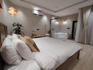 شاليه جريين اوايسس بمسبح وغرفة نوم واحده وصاله وجلسه خارجيه