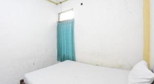 SPOT ON 92529 Penginapan Wisma Bintang Syariah Near MTs Al Maarif Kota Bangun