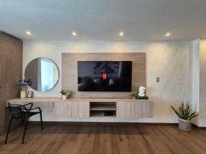 Moderna suite con balcón a pasos de la playa