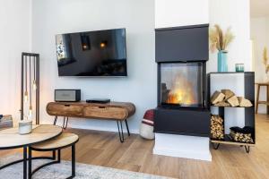 Haus "Hygge" mit Kamin, Sauna, Whirpool, Garten OFC 19