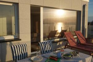 Zonnig Penthouse met Panoramisch Zeezicht