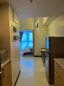 Cozy 1-Bedroom in Uptown Parksuites BGC