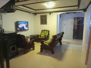 Vacation Home by Rowena Sacarez