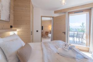 Alpe dHuez Houses - Chez Côme, Nid douillet dans résidence Spa 5 étoiles, skis au pied, avec vue et jardin