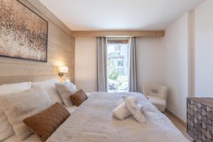 Alpe dHuez Houses - Chez Côme, Nid douillet dans résidence Spa 5 étoiles, skis au pied, avec vue et jardin