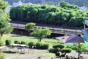 釜炒り茶の宿陽だまりTraditional Japanese house near Kumano Kodo and Nachi Falls with parking bikes garden and onsite tea house