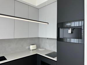 Designer Seaside Apartment with Dual Balconies