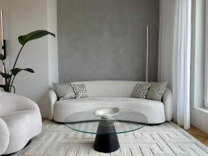 Designer Seaside Apartment with Dual Balconies