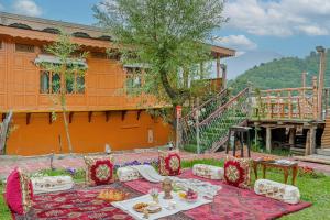 SaffronStays Prince of Kashmir - luxury handcrafted houseboat with mountain views, shikara rides & Kashmiri meals