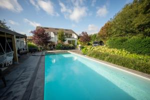 Vakantievilla met zwembad, wellness en glamping in PaalBeringen