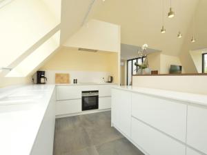 Lovely holiday home Walleken with a pond