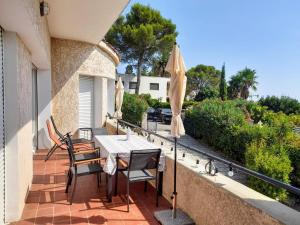 Appt 83m2 rez de jardin dans villa parc privé balcon vue mer