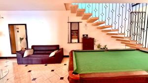 Loft para 4 en casa de huespedes con alberca comun