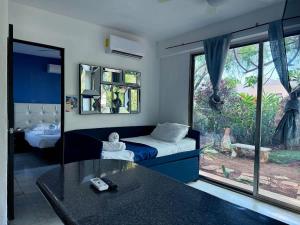 Loft para 4 en casa de huespedes con alberca comun