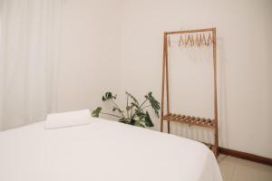 Apartamento Novo ao lado da Rua Mucugê com Ar, Wi-Fi, Estacionamento