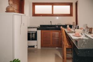 Apartamento Novo ao lado da Rua Mucugê com Ar, Wi-Fi, Estacionamento