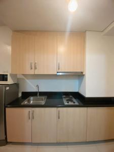 Light Residence Condo with Balcony and Pool View