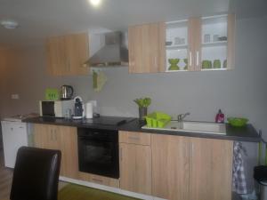 Appartements A la Ferme Bleue : photos des chambres