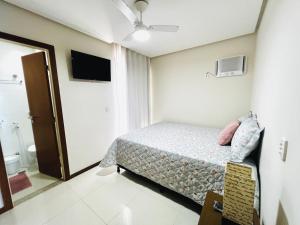 Apartamento frente mar na Praia do Morro - 3 quartos com 1 suíte, ar condicionado e enxoval premium