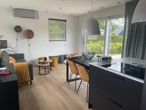 Chalet by Water in Idskenhuizen Recreation Park