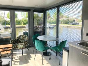 Houseboat in Heeg with Stunning Marina Views