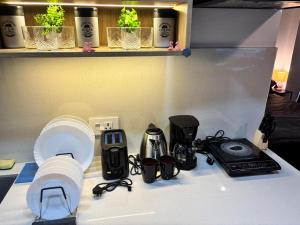 Vibrant Vision Near Airport with Coffee Maker & Wifi