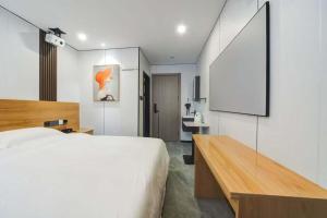 青岛 Jiumi Hutong Homestay 酒店 套房