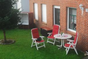 Ferienwohnung Nachbars Garten