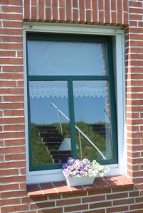 Ferienwohnung Nachbars Garten