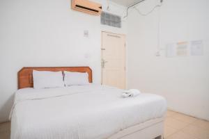 Urbanview Hotel Mine Residence Syariah