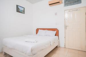 Urbanview Hotel Mine Residence Syariah