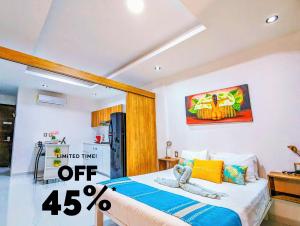 Romantic Playa Escape I 500m Award-Winning Beach I AC Pool Gym Patio Bikes WiFi 303