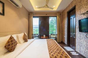 Cosy Grand, Chanakyapuri by The Cosy Hotels
