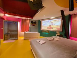 Capsule Family - Sauna - Jacuzzi - Projecteur - Billard - Nintendo Switch 2 - Filet suspendu