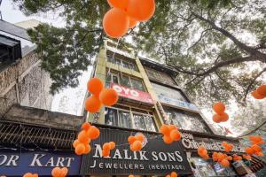 Hotel O POP A Happy Hours Plaza