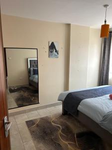 Tulia 1 BR apartment in Kasarani Nairobi with washing machine, lift , wifi, office desk and parking