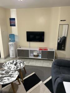 Tulia 1 BR apartment in Kasarani Nairobi with washing machine, lift , wifi, office desk and parking