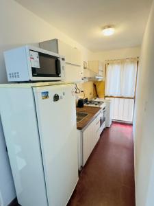 Gral paz Dpto completo con cama queen y seguridad