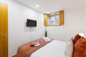 Modern & Central Flat w Garage by HostWise