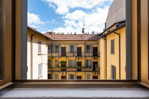 Cozy Milano Retreat with Laundry & Smart TV