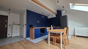 Anthracite Apartment on Felicjanek Street by CityBeat